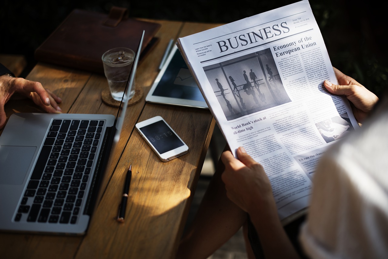 man reading newspaper